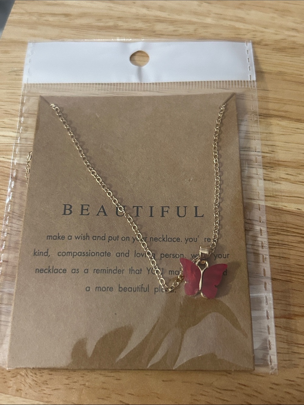 Gold Butterfly Pendant Necklace with Pink Enamel